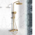 Orabella Oval Brushed gold - Shower column with a circular shower head Ø250